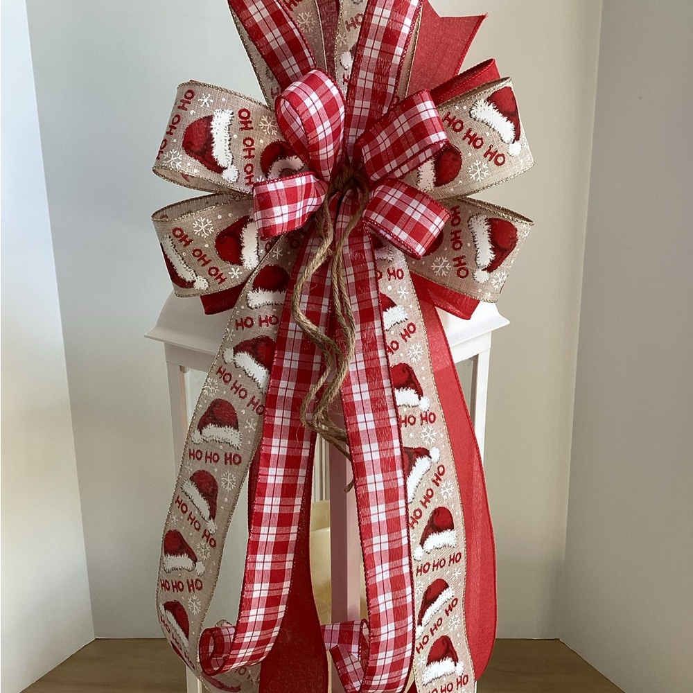 Festive Red Holiday Bow with Santa Hat Design